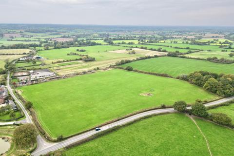 Land, in Manor Farm, £250,000