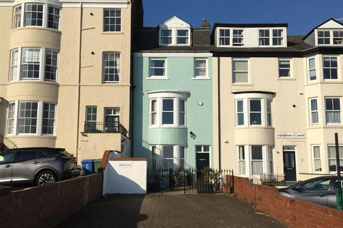Land, in Queens Parade, £475,000