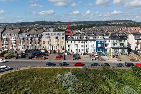 Land, in Queens Parade, £475,000