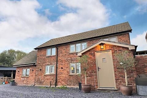 2 bed property, in Hetherson Green, £699,950