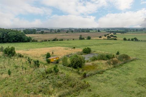 Land, in Ouston Moor, £300,000