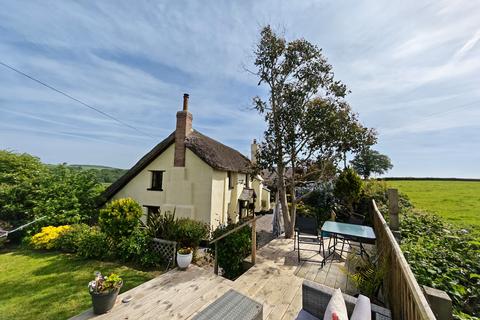 3 bed property, in Cheriton Bishop, £525,000
