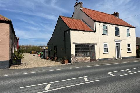 Land, in Main Street, £600,000