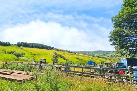 Land, in Higher Castleshaw Farm, £1,000,000
