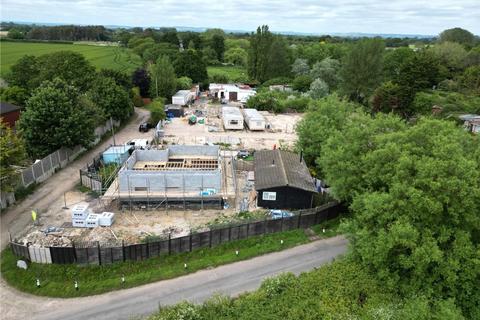 Land, in Ham Road, £190,000