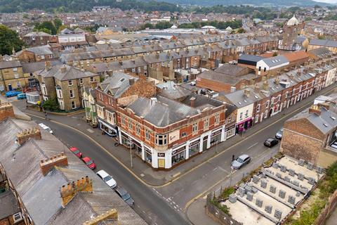 Land, in 135-141 Victoria Road, £550,000