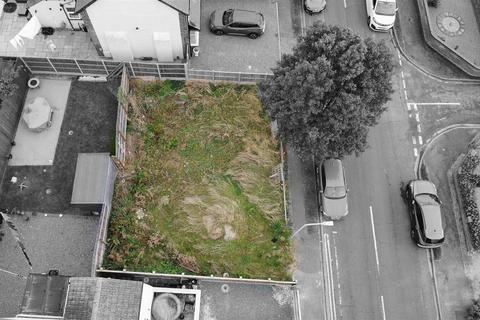 Land, in Roman Bank, £65,000