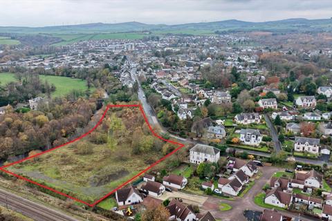 Land, in Tofts, £390,000