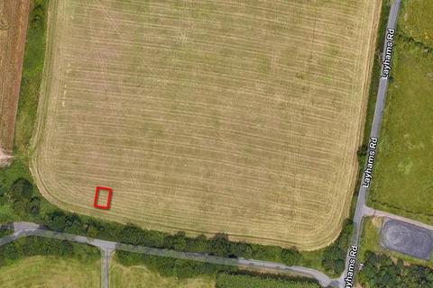 Land, in Plot 4 at Layhams Farm, £5,000