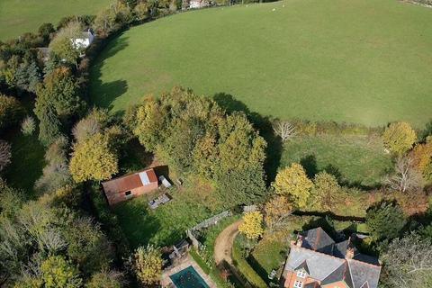 Land, in Nunnery Lane, £160,000