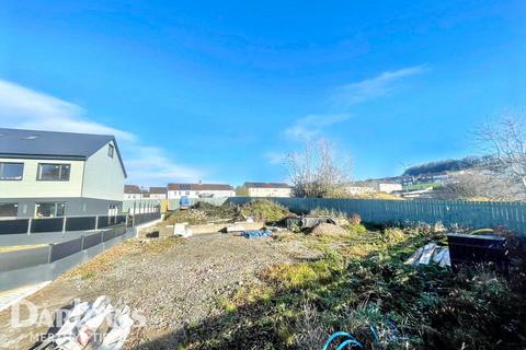 Land, in Ty Coch Farm, £120,000