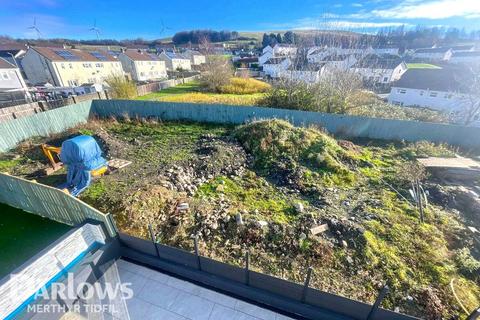 Land, in Ty Coch Farm, £120,000