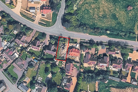 Land, in Thrapston Road, £200,000
