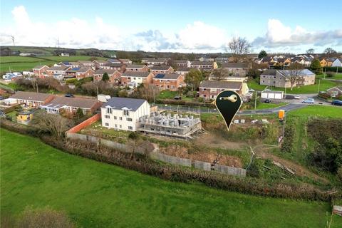 Land, in Crowbeare Meadow, £150,000