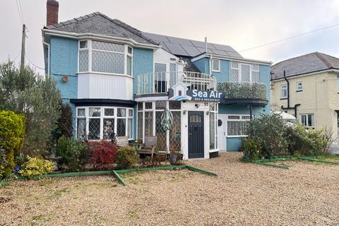 Land, in South Road, £400,000