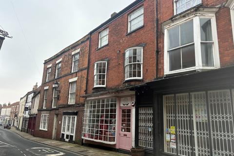 2 bed property, in High Street, £60,000