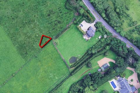 Land, in Plot 22 Near Borehamwood Brook, £3,000