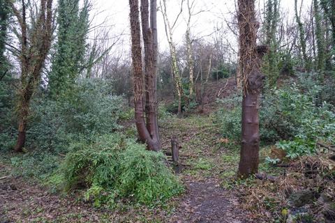 Studio, in Southall Wood, £90,000