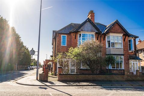 Land, in Queens Parade, £325,000