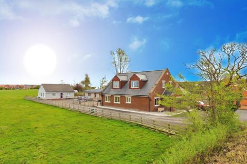 5 bed property, in Burtree Lane, £700,000