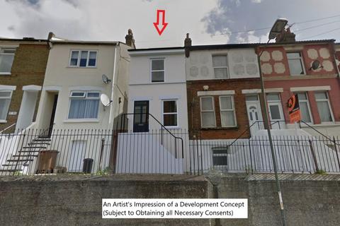 Land, in Upper Luton Road, £23,000