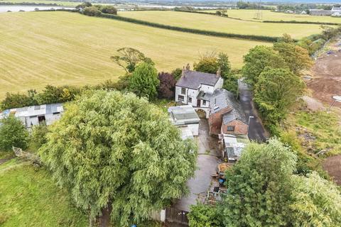 6 bed property, in Raikes Road, £695,000