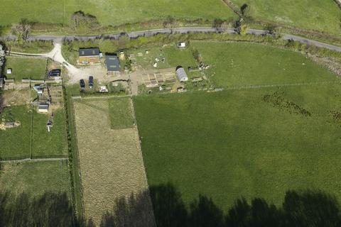 Land, in Ashover Road, £260,000