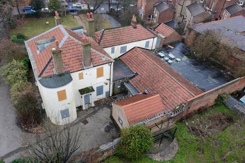 Studio, in Victoria Road, £250,000