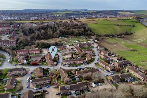 Land, in Hazel Close, £110,000