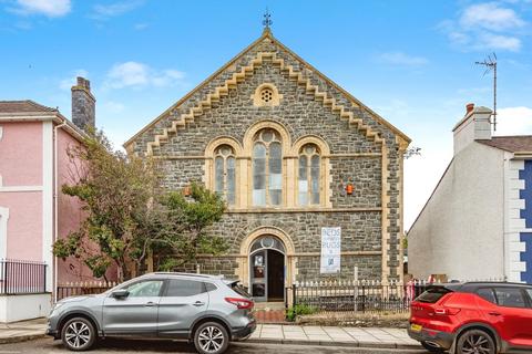 Land, in North Road, £190,000