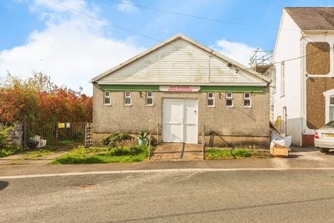 Land, in Gwilym Road, £140,000