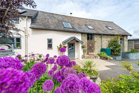 Land, in Churchstoke, £750,000