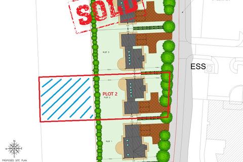 Land, in Hospital Road, £180,000