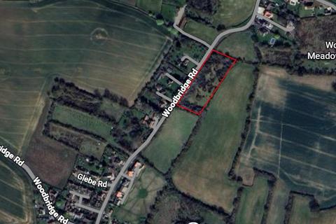 Land, in Woodbridge Road, £200,000