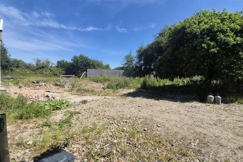 Land, in Langhams, £150,000