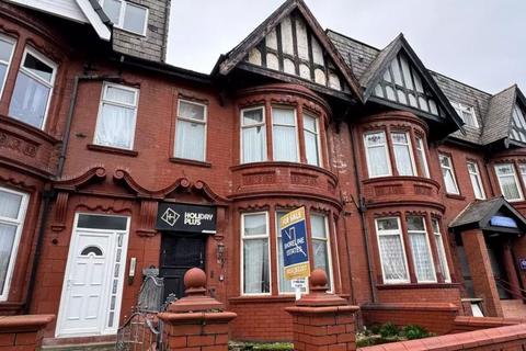Land, in Holmfield Road, £150,000