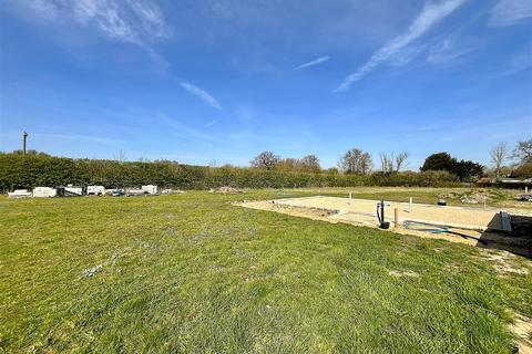 Land, in Blacksmith Close, £250,000