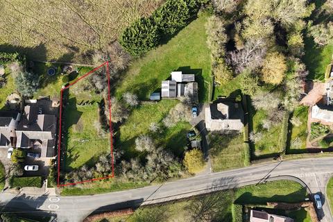 Land, in High Street, £225,000