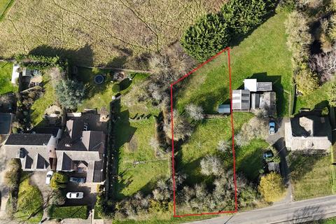 Land, in High Street, £250,000