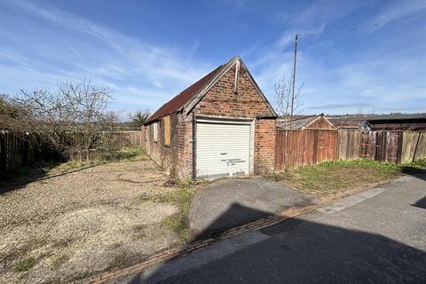 Land, in Station Road, £18,000