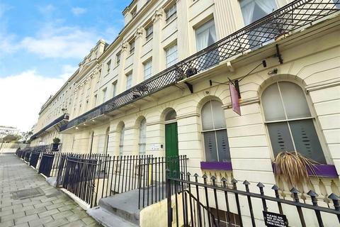 Land, in Oriental Place, £150,000