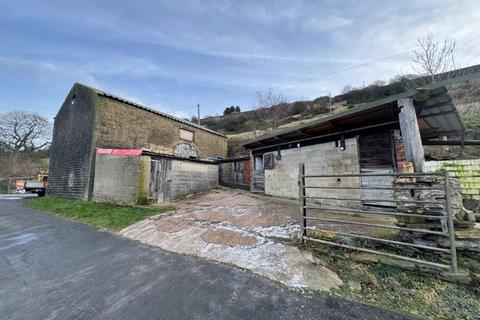 Land, in Barn and Land, £260,000