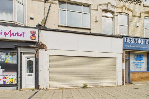 Land, in Borough Road, £160,000