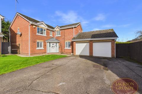 5 bed property, in Burton Close, £595,000