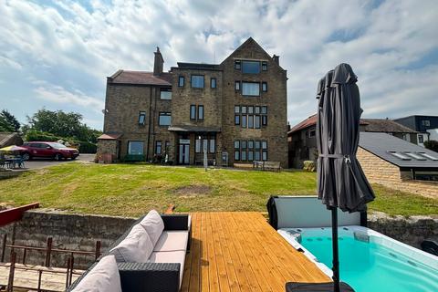 7 bed property, in Brighouse & Denholme Road, £1,395,000