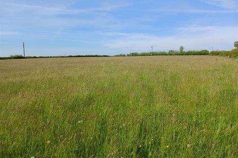 Land, in East Taphouse, £280,000