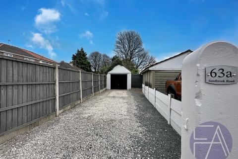 Land, in Sandbrook Road, £35,000