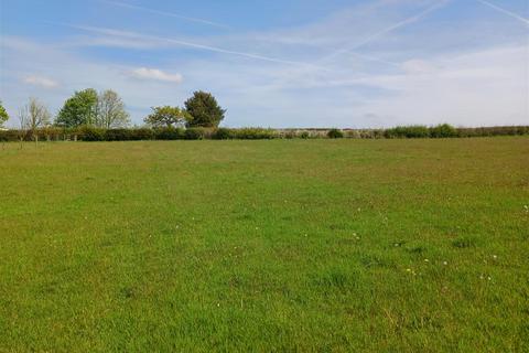 Land, in East Taphouse, £55,000