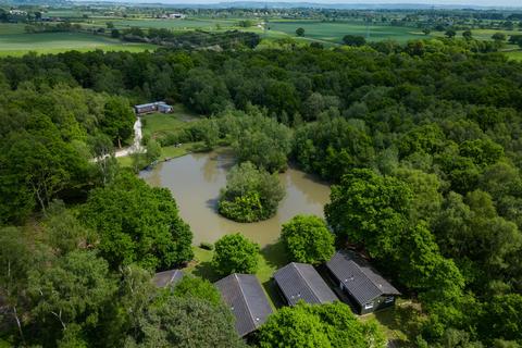 Land, in Great Wood Eco Lodges, £750,000