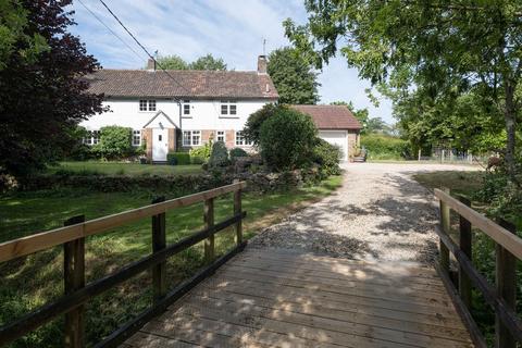4 bed property, in Winterbourne Monkton, £975,000
